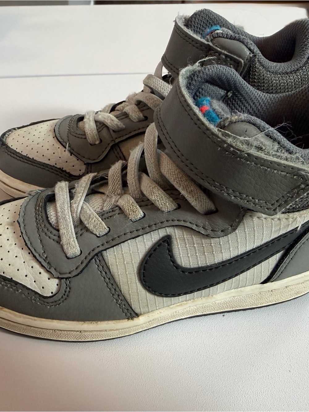 Nike Kids High-Top Sneakers in Gray and White with Black Swoosh